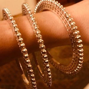 3 Unique Detailed Silver Colored Bracelets